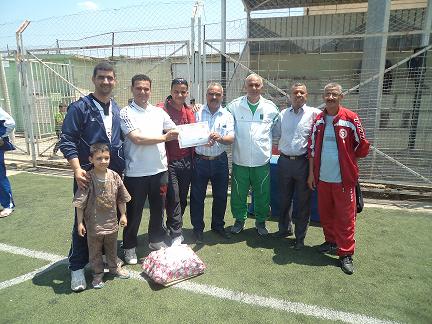أجواء مباراة في كرة القدم الولائية